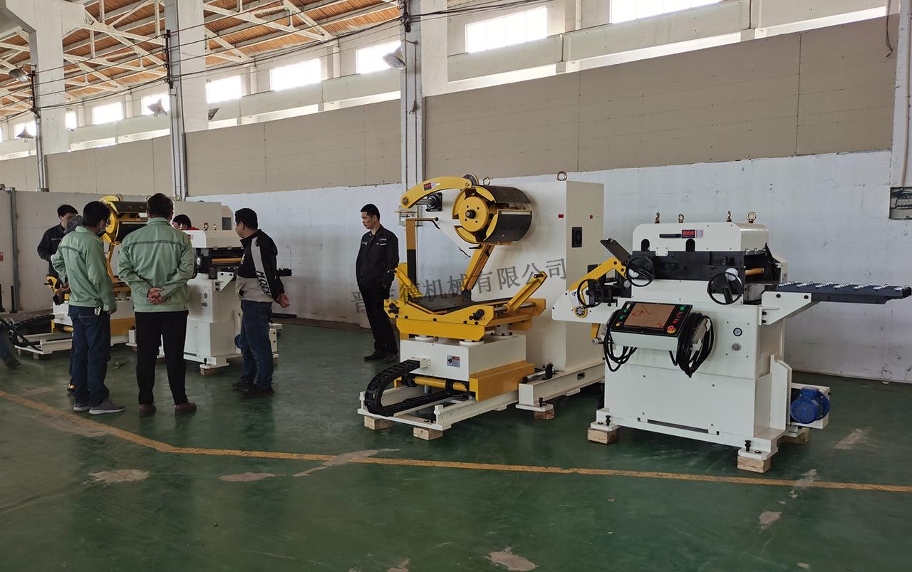三合一送料機(jī)校辦工廠